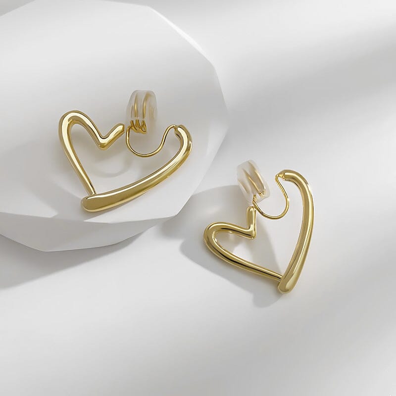 Boucles d'oreilles en forme de coeur doré pour femmes, design élégant et moderne, accessoires bijouterie faits main