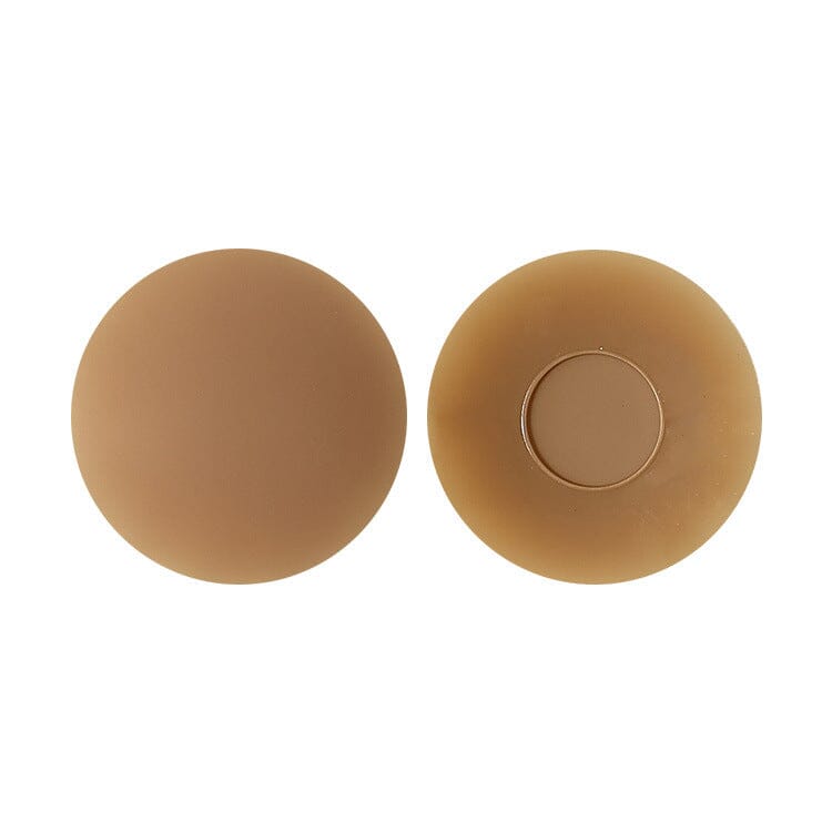 Cache-tétons adhésif couleur chair, doux et confortable pour un maintien sécurisé et discret sous les vêtements.