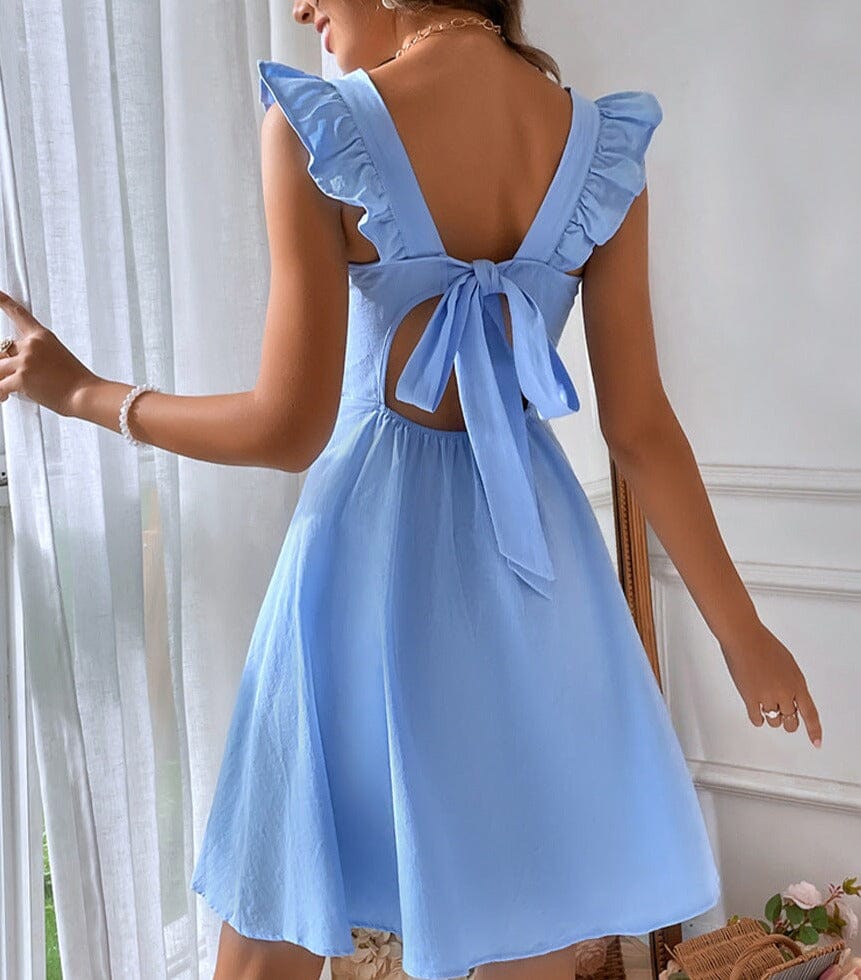 robe courte dos nu evangeline bleu clair avec nœud, idéale pour une tenue d'été élégante et aérienne