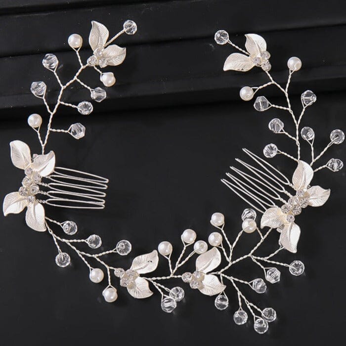 accessoire de coiffure pour mariage avec perles et fines branches en argent, idéal pour embellir les cheveux de la mariée