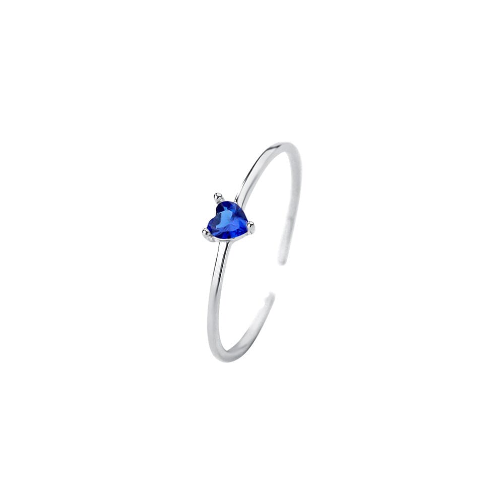 bague coeur diamant en argent avec pierre précieuse bleue en forme de coeur parfaite pour une occasion spéciale