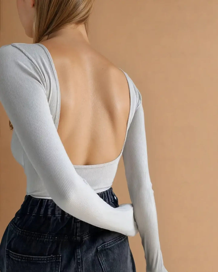 Body dos nu manches longues Chiara, élégant et moderne, parfait pour un look décontracté ou sophistiqué.