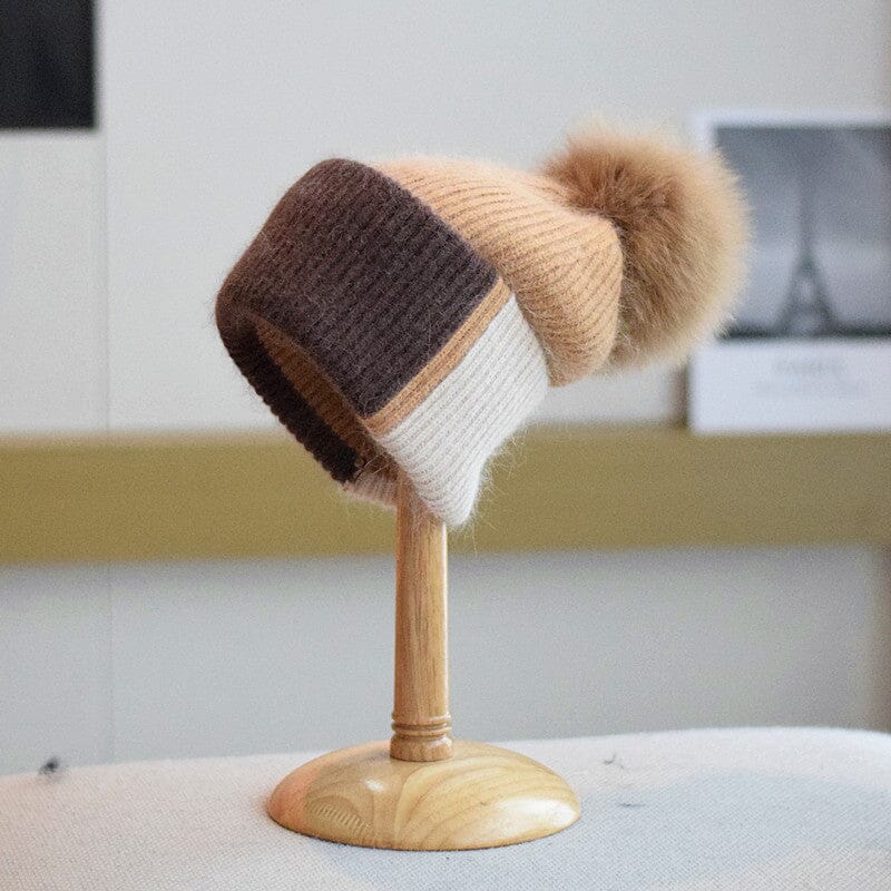 bonnet en laine avec pompon pour femme, modèle coline, dans les tons marron, crème et beige, parfait pour l'hiver