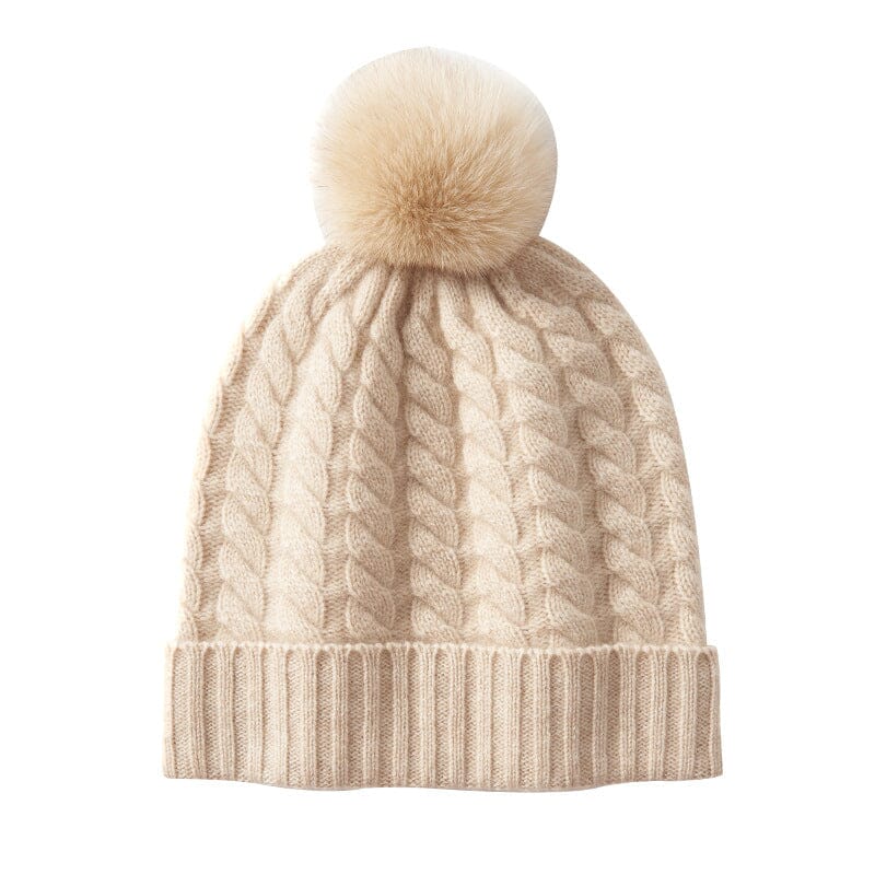 bonnet cachemire femme avec pompon beige pour l'hiver, modèle fanny tricoté avec motifs torsadés élégants et doux