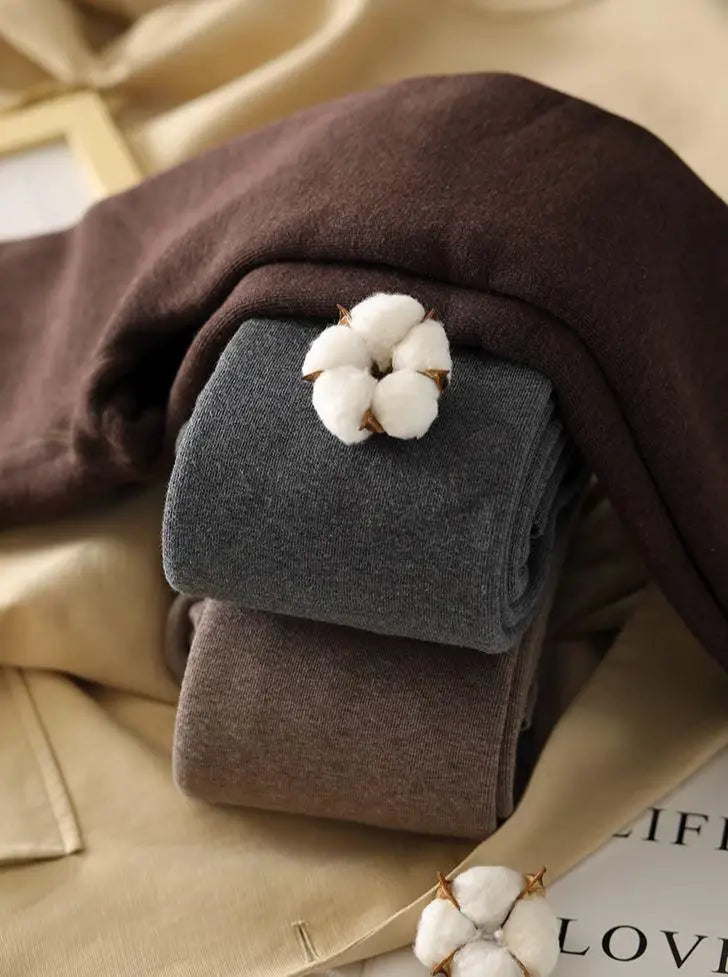 collant molletonné en cachemire pour hiver disponible en plusieurs coloris, vue des différentes teintes empilées