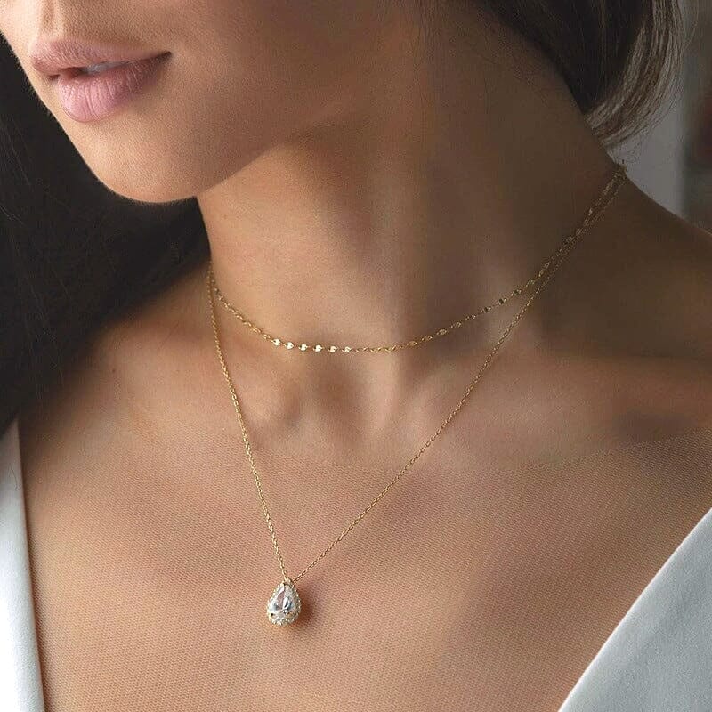 collier de dos mariage délicat en or avec pendentif en cristal scintillant, parfait pour une mariée élégante et raffinée