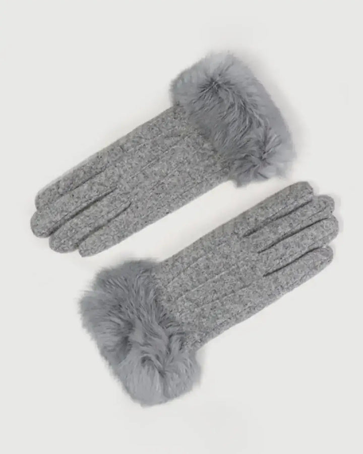 Gants en cachemire gris avec extrémités en fourrure synthétique douce, élégants et tactiles pour un confort hivernal optimal.