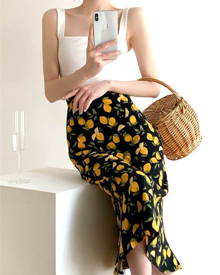 jupe fluide mi-longue Béatrice avec motifs de citrons, idéale pour un look estival chic et décontracté