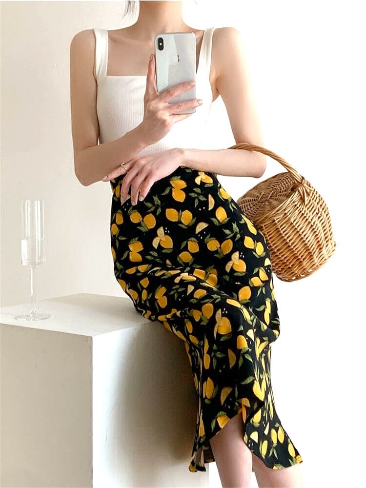 jupe fluide mi-longue Béatrice avec motifs de citrons, idéale pour un look estival chic et décontracté