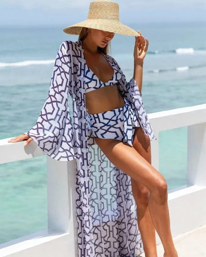 kimono de plage lisa élégant pour l'été avec motif géométrique bleu et blanc, idéal pour des vacances au bord de la mer