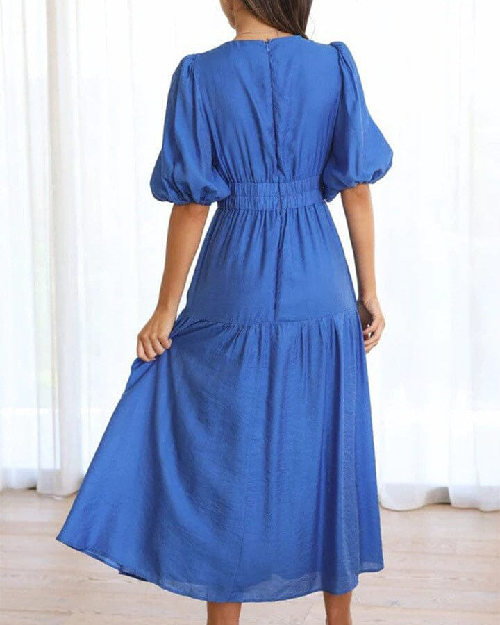 robe décolleté plongeant annie vue de dos avec manches bouffantes et tissu fluide bleu pour une élégance estivale