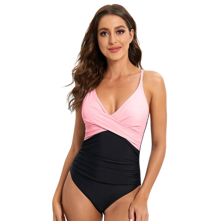 maillot de bain sculptant chelsea une-pièce rose et noir avec bretelles fines et décolleté en v modèle femme fond blanc