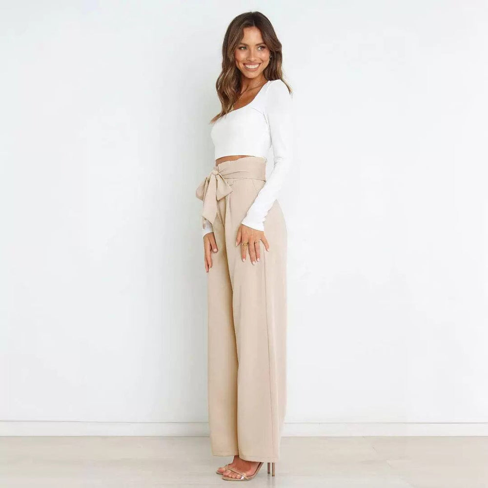 pantalon fluide taille haute olga en lin, modèle féminin décontracté et élégant, couleur beige avec ceinture à nouer