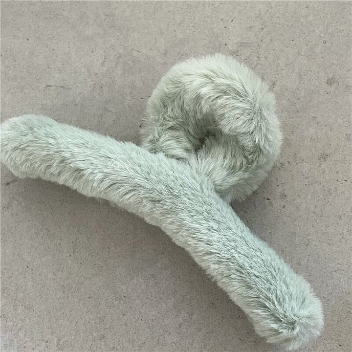 Pince à cheveux Amélie en peluche douce pour un style élégant et confortable, accessoire tendance pour sublimer vos coiffures.