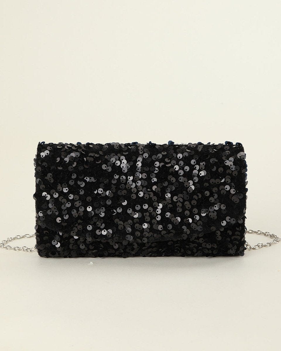 Pochette de soirée noire avec sequins brillants et chaîne argentée, accessoire élégant pour événements et sorties nocturnes.