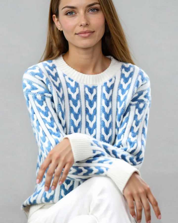 Pull torsadé bicolore Amaryllis pour femme, motif unique en laine douce, modèle stylé et confortable, bleu et blanc.