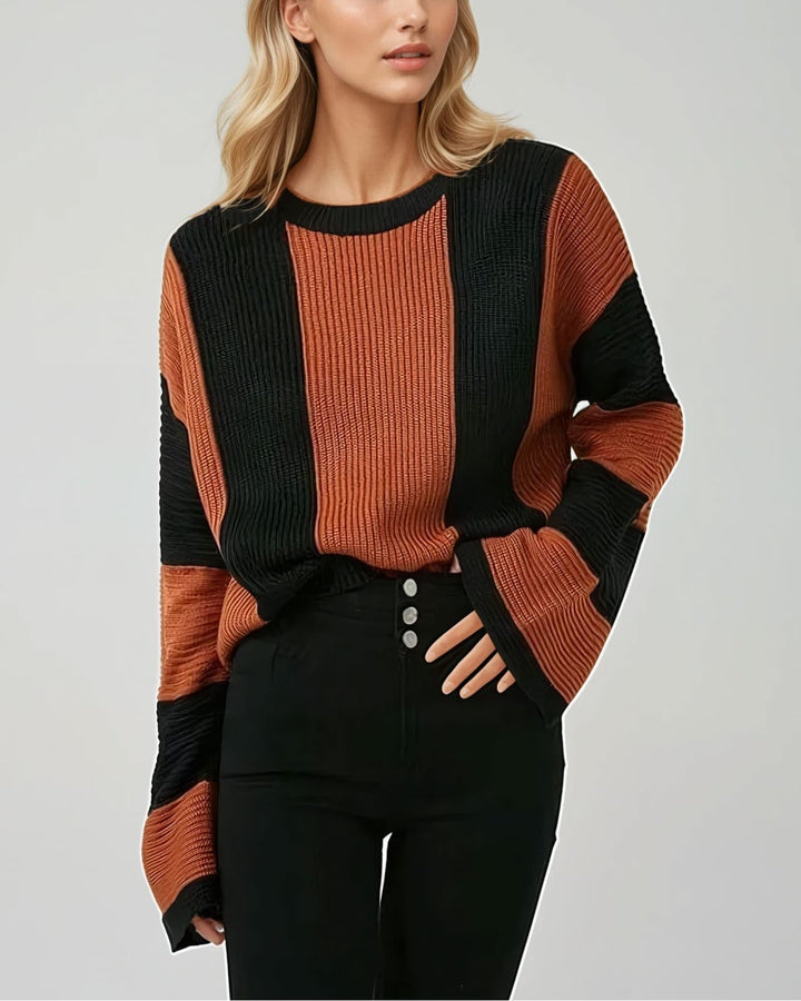 Pull oversize à rayures noires et marron pour femme, idéal pour un look décontracté et chaleureux en toute saison.