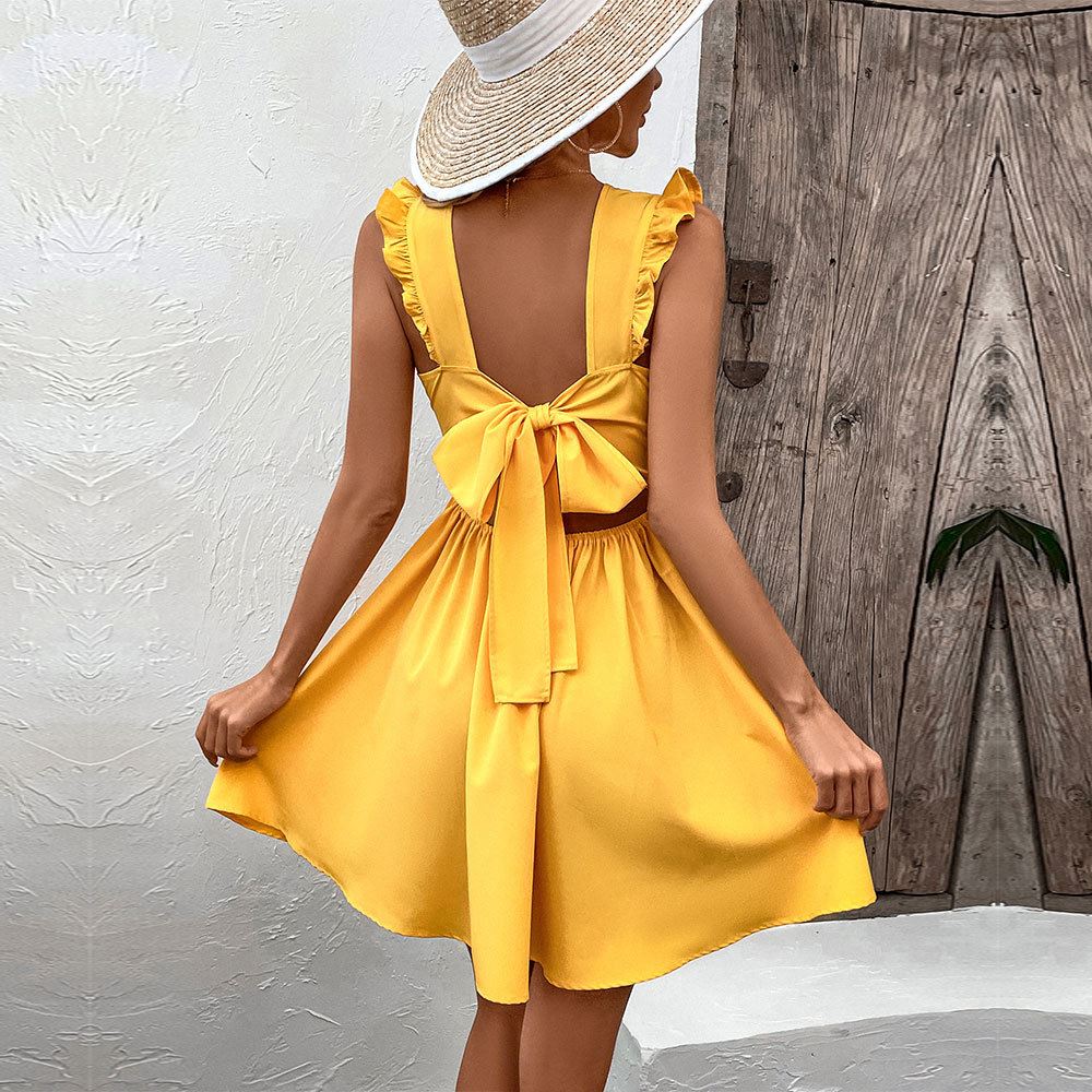 robe jaune femme sans manches avec noeud au dos, parfait pour l'été, modèle coralina, dos nu avec volants