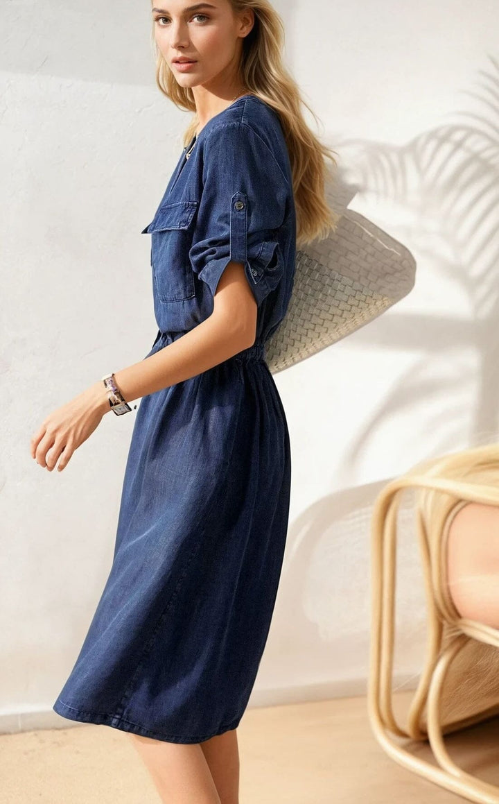 Robe mi-longue fluide habillée florence portée par une femme, idéale pour un look chic et élégant en toute occasion