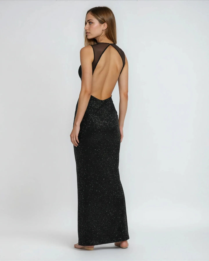 Robe cocktail strass nessa élégante noire avec détails scintillants, idéale pour soirées et événements spéciaux tendance.