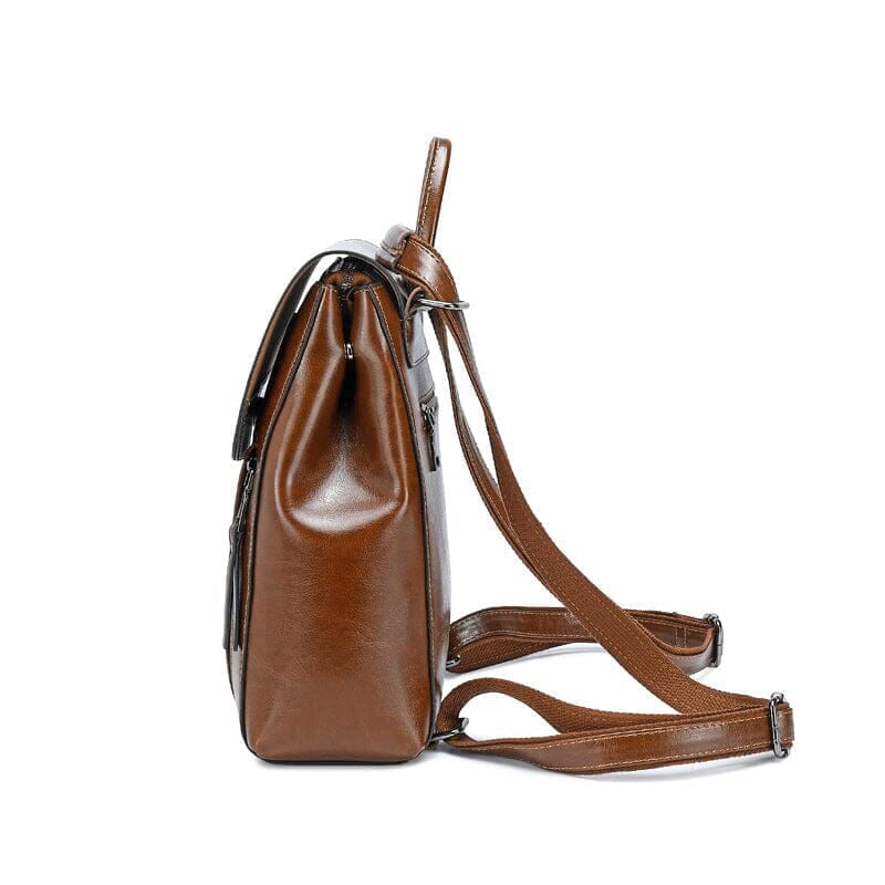 sac à dos en cuir pour femme, vue latérale, marron avec bretelles réglables, design élégant et moderne pour usage quotidien