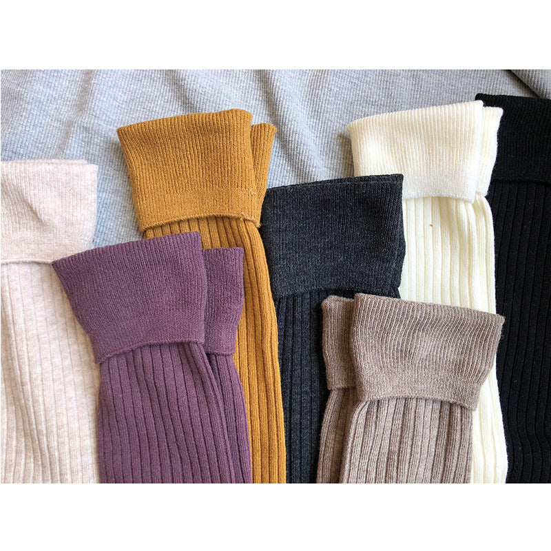 chaussettes hautes mi cuisses femme laine coton dans différents coloris telles que noir, blanc, violet, beige et marron