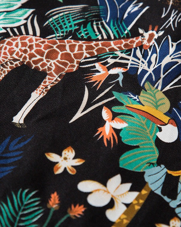 débardeurs tropical femme avec motif girafe et toucan sur fond noir idéal pour l'été et les looks décontractés