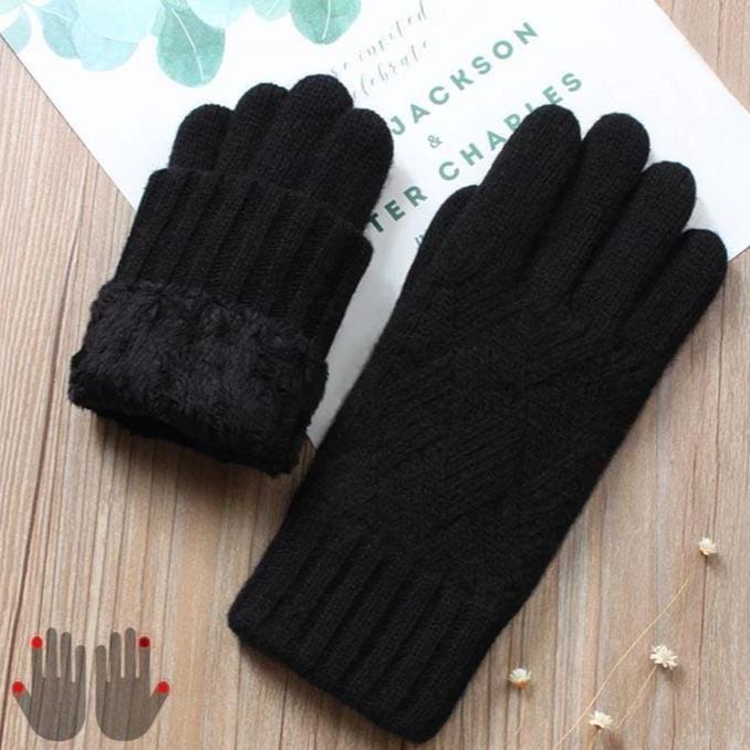 gants polaire tactiles femme noirs avec doublure chaude et design élégant pour l'hiver, posés sur une table en bois