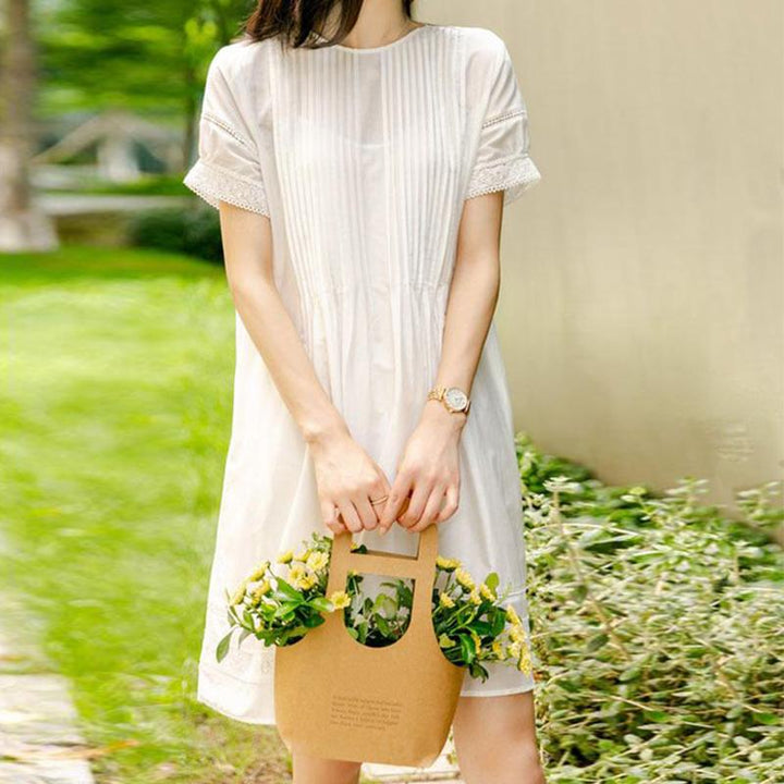 robe blanche en coton pour femme, modèle yveline, élégante et confortable, idéale pour l'été et les occasions décontractées