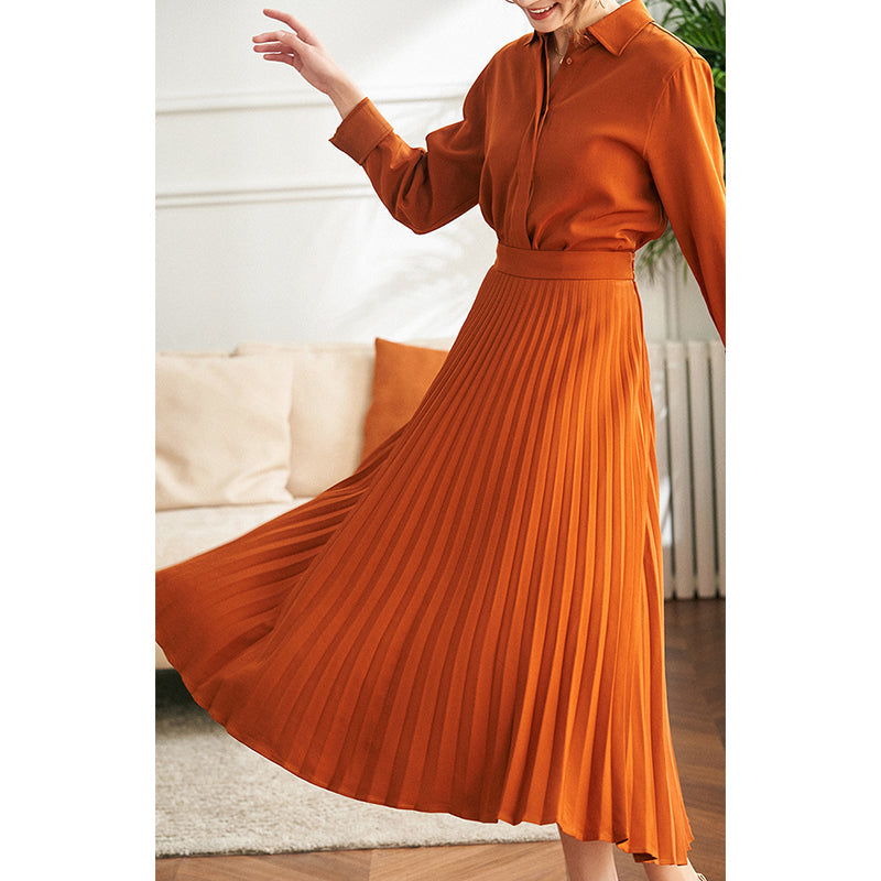 robe chemise olly en coton orange avec manches longues et jupe plissée, idéale pour une tenue élégante et confortable