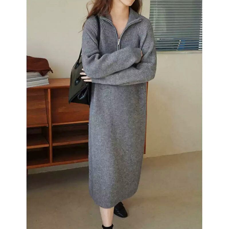 Robe en laine longue gris pour femme avec manches longues, idéale pour l'hiver et les journées fraîches. Style casual et chic.