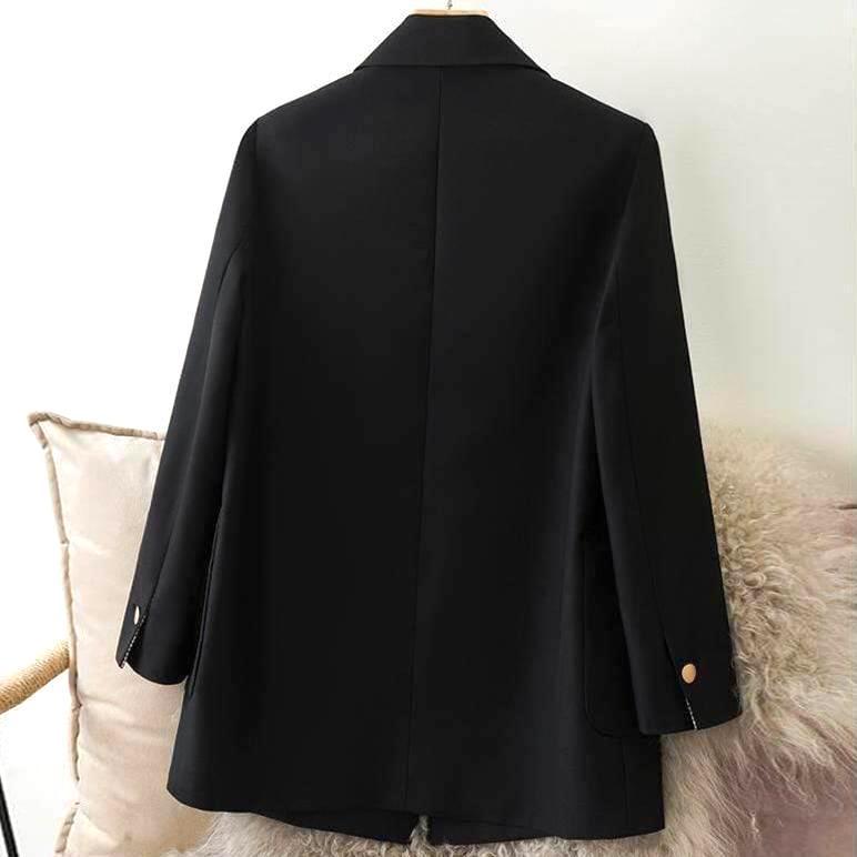 veste blazer noire pour femme elliot chic et élégante vue de dos sur chevet éléments de mode prêt à porter